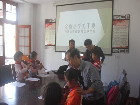 20170612113705_金山小學(xué)關(guān)工委走進西津古渡社區(qū)居民學(xué)校.jpg
