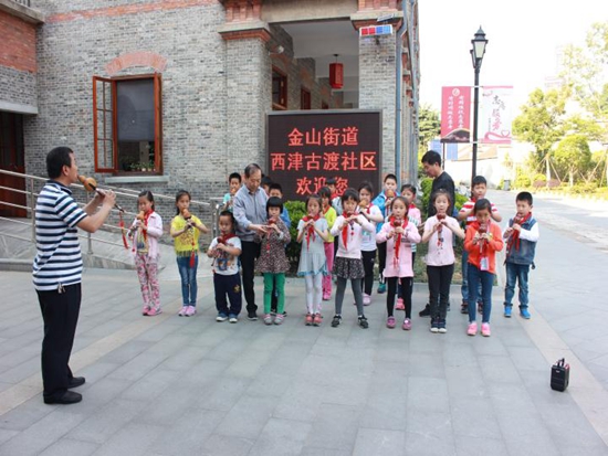 20170612113713_金山小學(xué)關(guān)工委走進西津古渡社區(qū)居民學(xué)校2.jpg