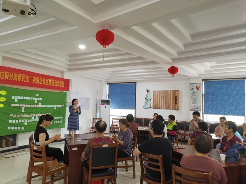 個(gè)案小組話教學(xué)助力垃圾分類(lèi)樓道自治.jpg